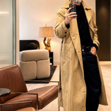 aaron levine wears auter italian cotton trench 
